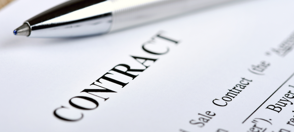 Legal contract signing - buy sell real estate contract