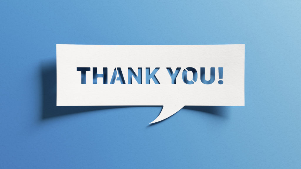 A blue graphic with the words 'thank you' in capital letters in a quote bubble in the middle of the page in white